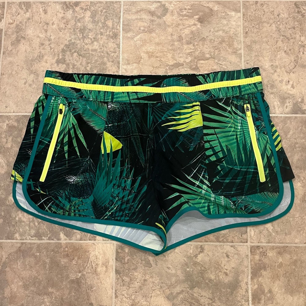 Fabletics Green Tropical Print Athletic Shorts with Lime Zippers
